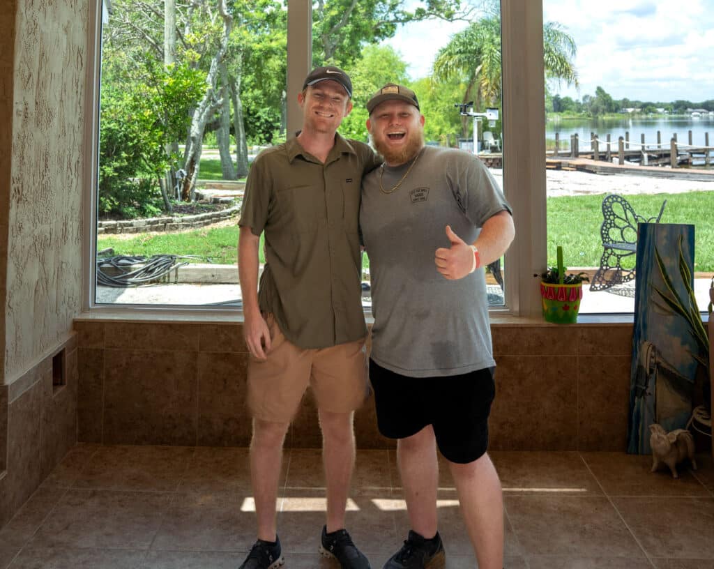 Urban Shadeworks owners Zach Davis and Case Spiker with company service vehicle