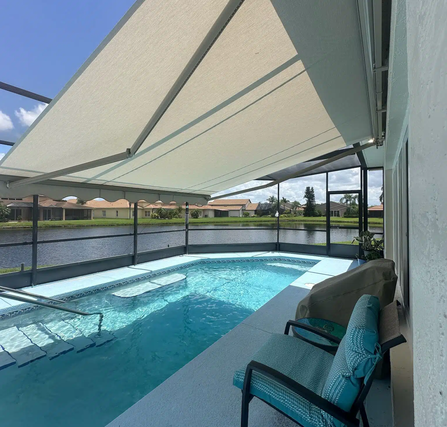 Family enjoying outdoor dining under motorized retractable awning in Winter Haven FL